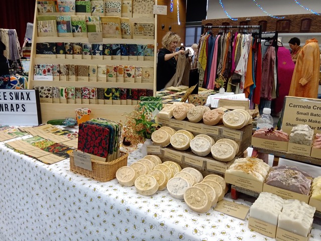 Photograph of a stall selling wraps and soaps