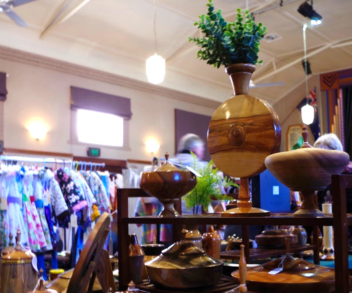 Photograph of a market stall selling timber products